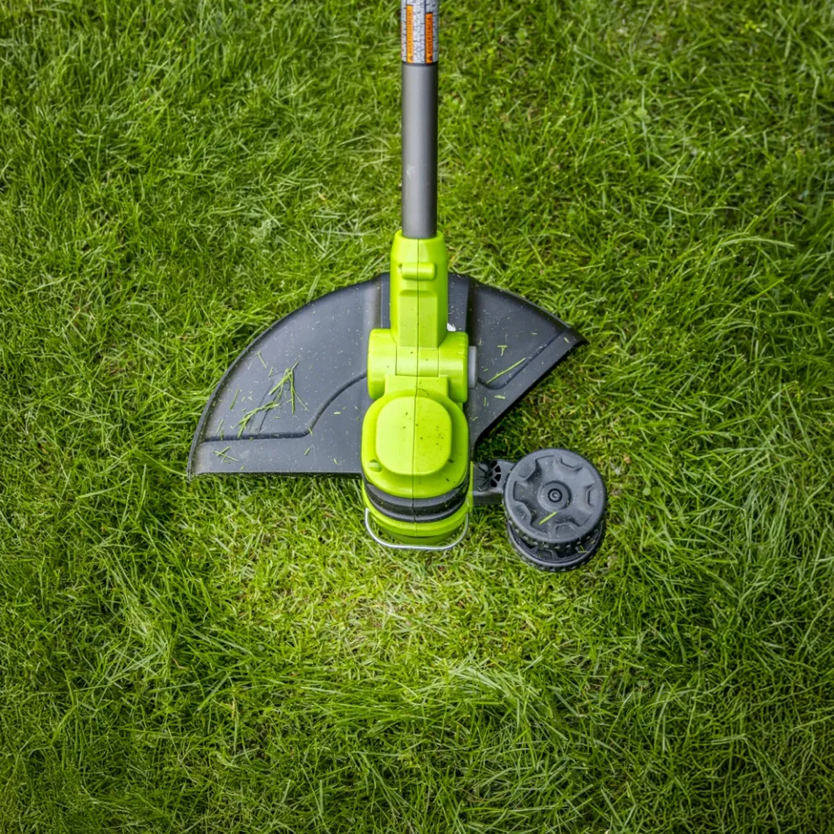 Greenworks 24V sláttuorf 33 cm – klippihaus séður ofan frá